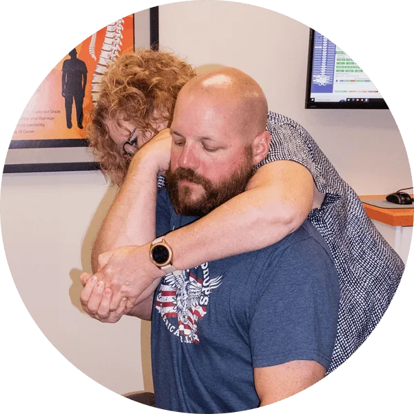 Dr. Downes adjusting a patient
